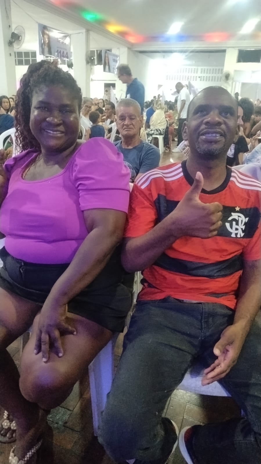Participantes reunidos em evento comunitário